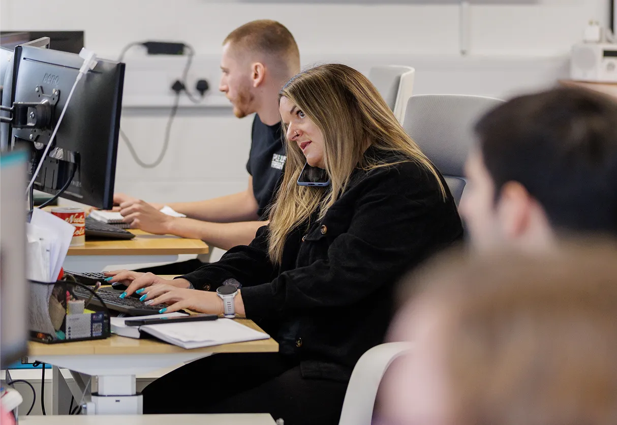 Plexus Freight account managers handling logistics operations in our Bristol shipping office.